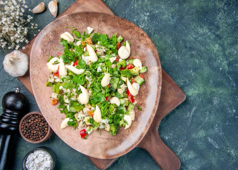 Garden salad with a mix of lettuce, cucumber and tomato